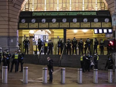 Officer charged over Vic station assault