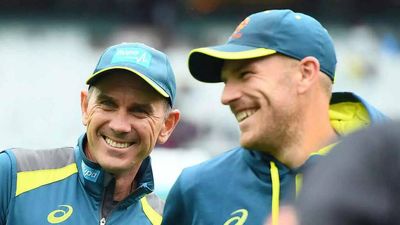 Aaron Finch won't comment on Justin Langer's contract extension but praises coach