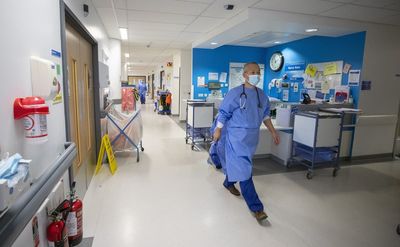 Council workers support medical staff on wards at under-pressure health board
