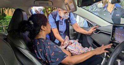 Mum, 33, gives birth in car outside hospital as tearful husband catches newborn baby