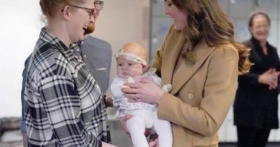 Prince William rules out having another baby as Kate Middleton cradles cute tot