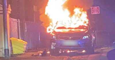 Man charged after car torched in deliberate attack caught on camera