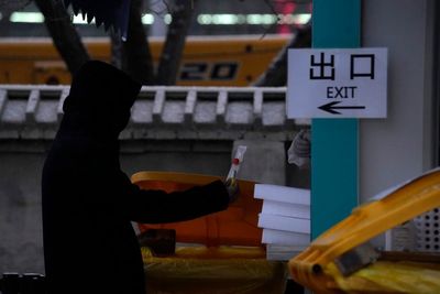 China's success taming virus could make exit strategy harder