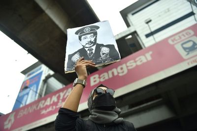 Malaysian protesters demand resignation of anti-graft chief