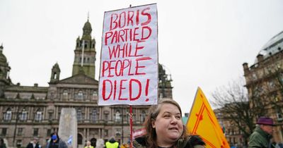 Pro-independence activists march through Glasgow in protest against Boris Johnson
