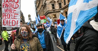 Pro-independence activists march through Glasgow and protest against Boris Johnson