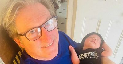 Line of Duty's Adrian Dunbar shares adorable photo with baby granddaughter in AC-12 uniform
