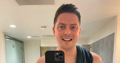 Dr Alex George hits back at cruel 'fat shamers' as he strips topless for gym selfie