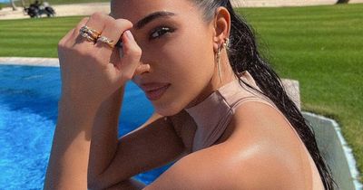 Kim Kardashian flaunts incredible figure after having 'bum implants removed'