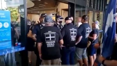 Three people arrested after anti-vaccination rally at Mackay shopping centre