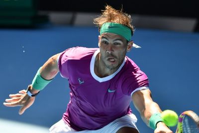 Nadal survives epic tiebreak to power into quarters