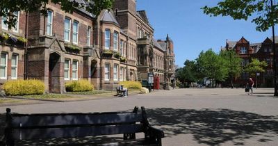 The 'naturally happy' town near Manchester - while another neighbour 'suffers in the shade'