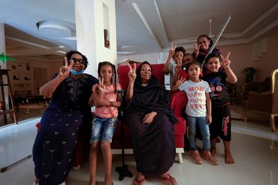 Sudanese women's rights activist Osman detained in raid, her sister says