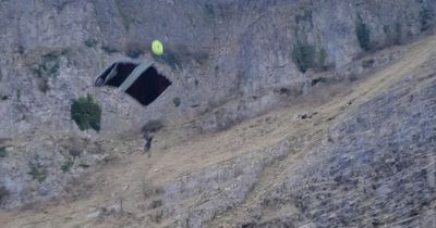 Incredible pictures show base jumpers at Cheddar Gorge and 'an aggressive goat'