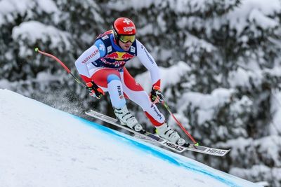Switzerland's Feuz powers to third Kitzbuehel downhill victory
