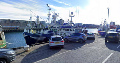 Man dies in hospital after being pulled from water at Scots harbour