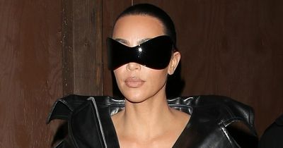 Kim Kardashian baffles fans with 'ridiculous' Matrix-inspired look in black trench coat