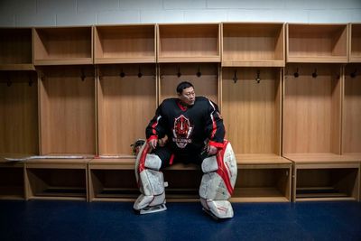 AP PHOTOS: Olympics get Chinese hockey veterans back on ice