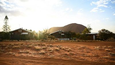 NT Police charge 18-year-old man with murder over stabbing death in community near Uluru