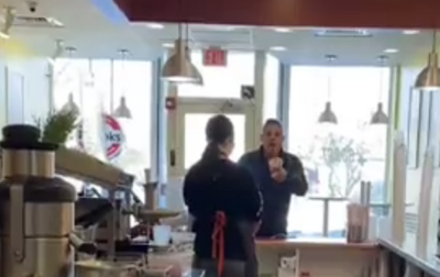 Merrill Lynch executive arrested after racist attack on store workers over smoothie order is caught on video