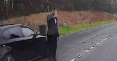 Sinister black BMW driver scamming motorists for cash at side of Scots roads