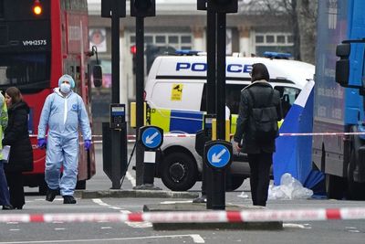 Woman stabbed to death and man killed after being hit by car in west London