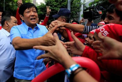 Philippines' presidential bet Marcos shuns talk of past atrocities