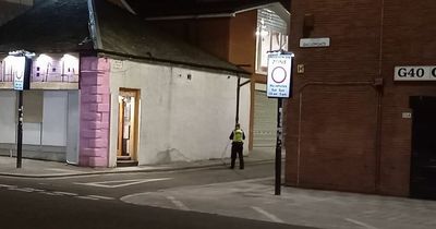 Man rushed to hospital after serious assault as cops lock down Glasgow street