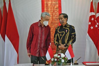 Indonesia, Singapore sign key defense, extradition treaties