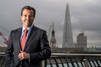 Credit Suisse warns of trading slowdown and legal costs
