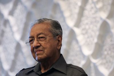 Former Malaysia PM Mahathir's condition improving, to remain in hospital