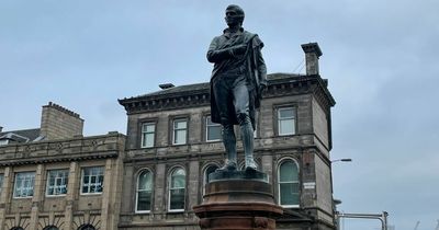Edinburgh locals baffled as much-hyped Robert Burns statue 'unveiled from a bin bag'