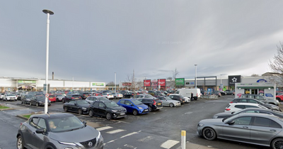 Edinburgh stranger opens car and demands money from driver in retail car park