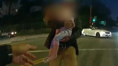 VIDEO: LAPD Cop Saves Choking Girl After Frantic Dad Asks For Help