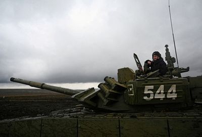 What threat? Russian state TV plays down Moscow's role in Ukraine crisis