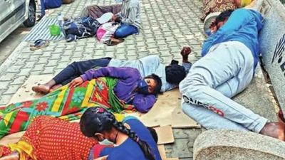People needing cancer care sleep on pavement in Bengaluru as they await Covid result