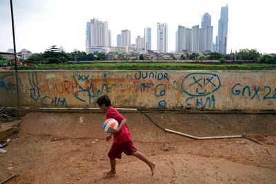 Indonesia's capital is sinking, polluted and now moving