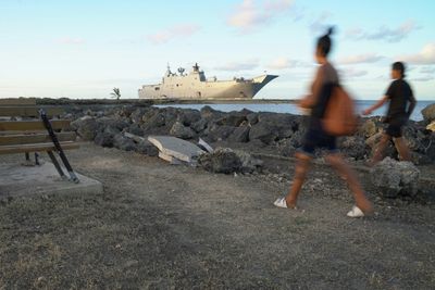 Covid-hit Australian warship delivers disaster aid to Tonga