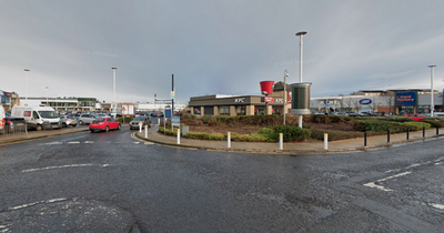 Thug bursts into car and demands cash from driver in terrifying incident at Scots retail park