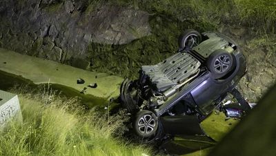 Car veered 100 metres along median before crashing into storm drain