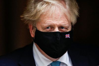 Getting on with the job, UK PM Johnson says he will not resign