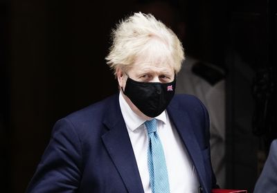 Johnson insists ‘I am getting on with the job’ as he awaits partygate report