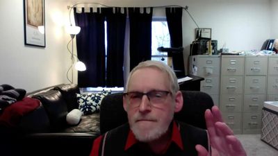 Professor suspended over video sues Michigan university