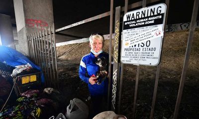 ‘Trying to disappear the poor’: California clears homeless camp near Super Bowl