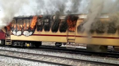 Job-seekers burn train coaches in India after alleged flaws in railway recruitment