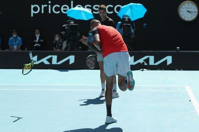 Kyrgios smashes racquet, flips finger as he reaches doubles final