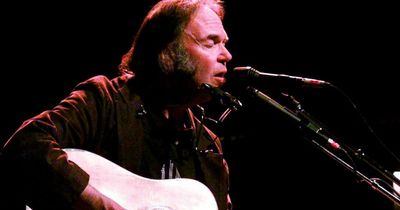 Rock legend Neil Young pulls music from Spotify in row over comedian's podcast