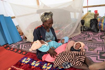 After narrow escape from violence, Cameroon refugee gives birth to triplets