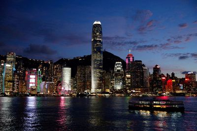 Hong Kong to cut quarantine for arrivals to 14 days from next month