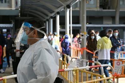 Hong Kong shortens on-arrival quarantine from three weeks to two